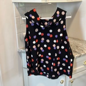 Reminiscent of old Jacki-O, rounded collar sleeveless top